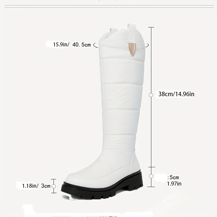 Women's knee-high padded winter boots with lug soles