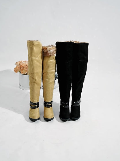 Women's wedge boots with faux-fur trim and buckles
