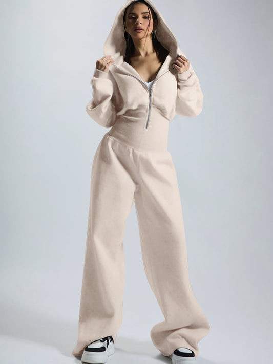 Women's jumpsuit with hood, long sleeves, wide legs, and zipper