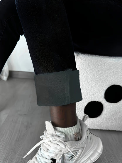 Black fleece-lined thermal jeans leggings with stretch for women