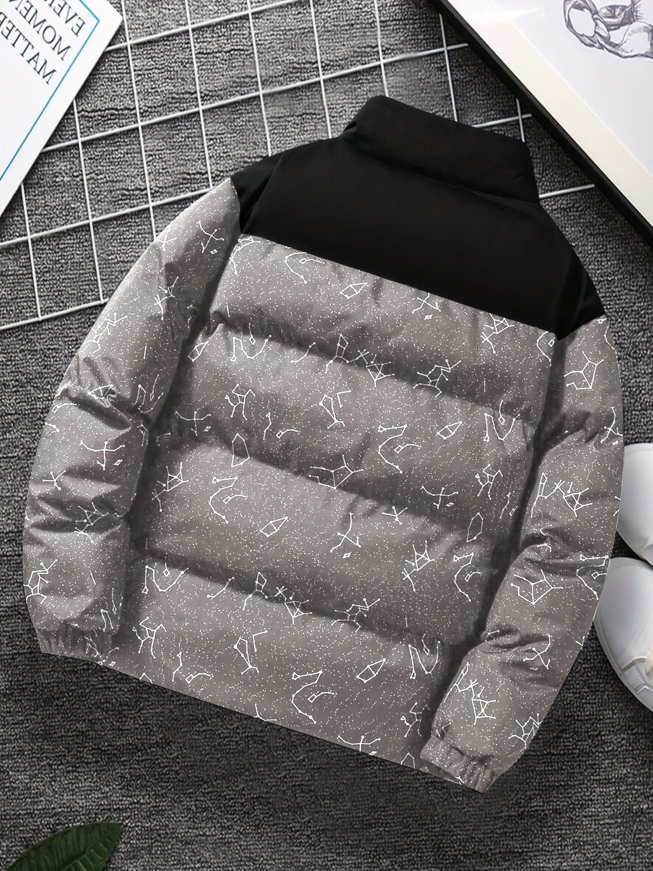 Padded jacket with constellation print, zipper, and stand-up collar