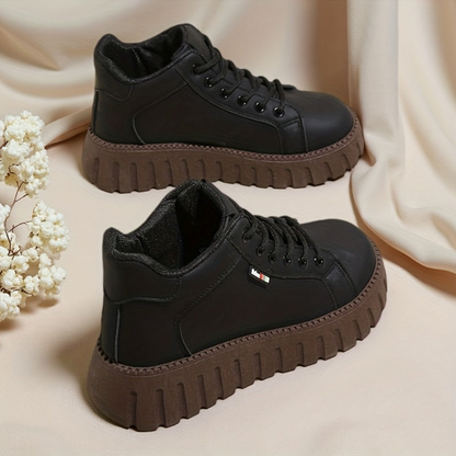 Women’s black lace-up ankle boots with chunky soles