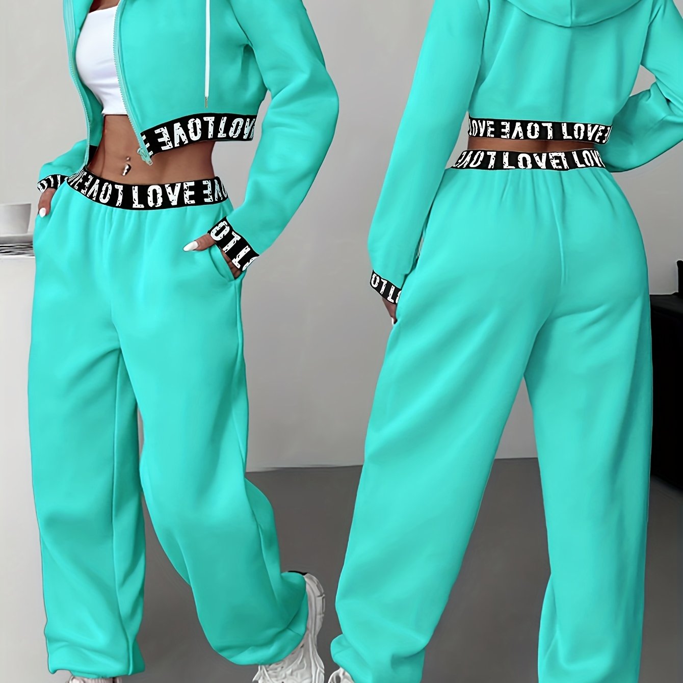 Women's two-piece tracksuit with a hooded jacket and cropped-length joggers featuring a “LOVE” waistband