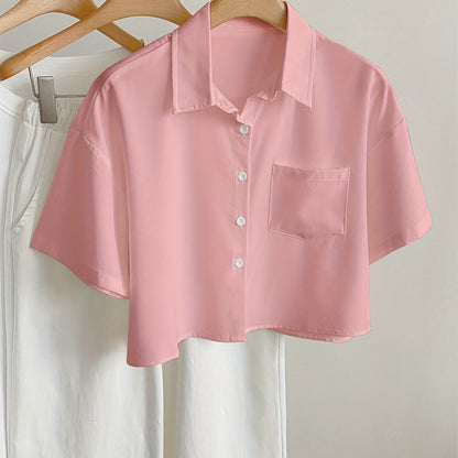 Women's short-sleeve blouse with crop cut and chest pocket – modern casual shirt