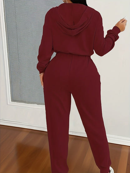 Women's jumpsuit with hood, zipper, and elastic waist