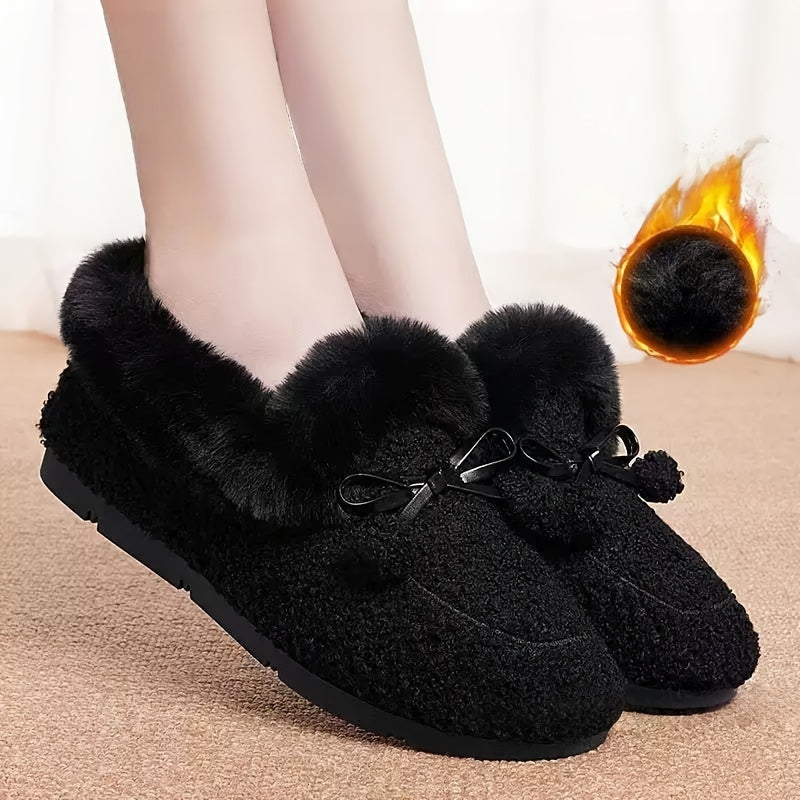 Women's black plush slippers with a bow
