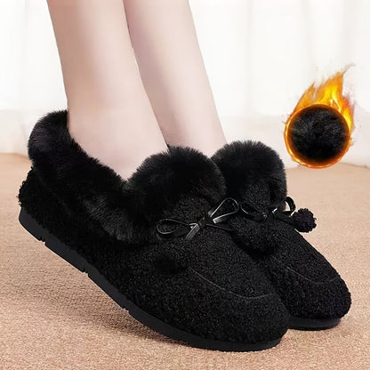 Women's black plush slippers with a bow