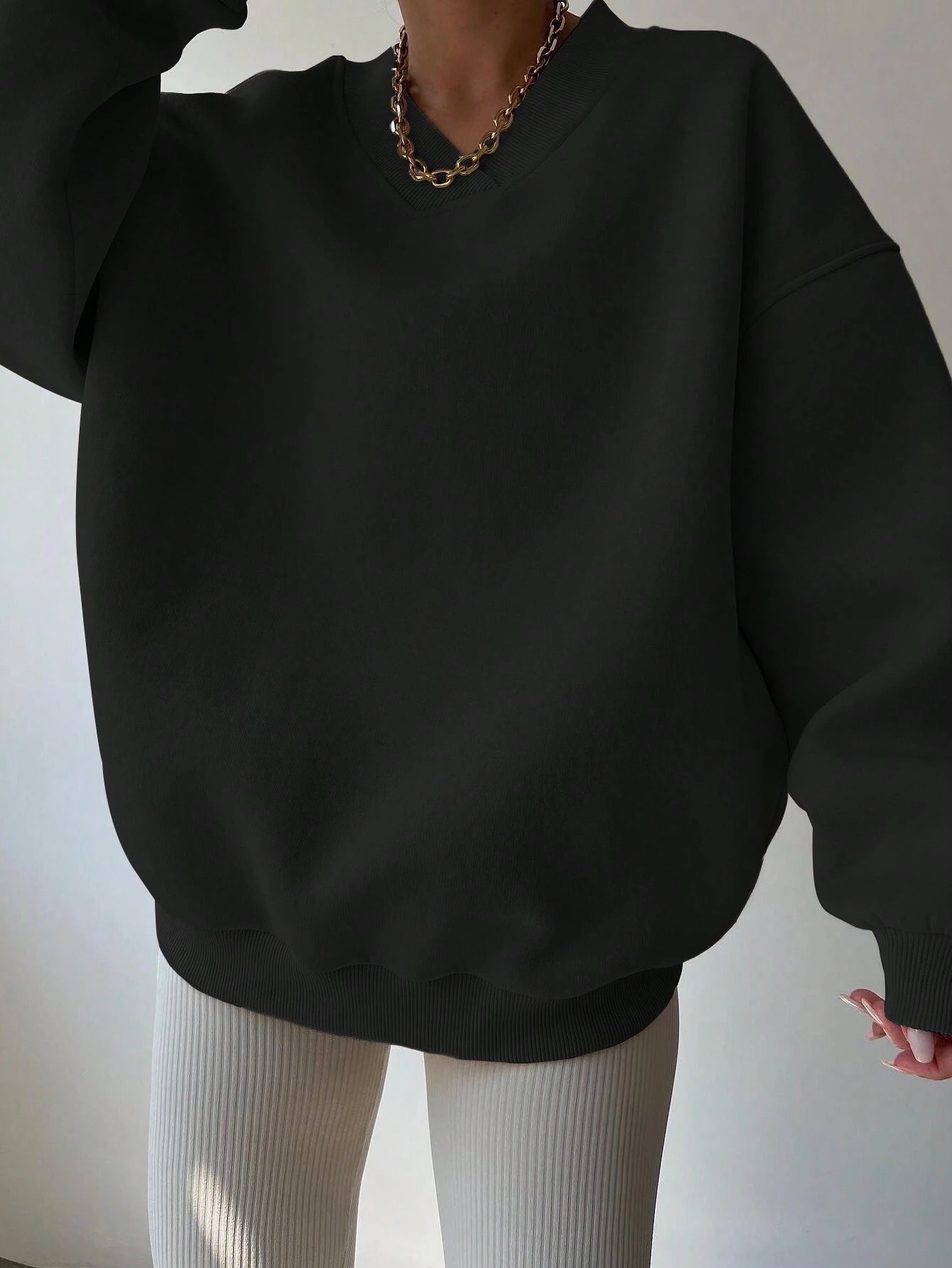 Black oversized V-neck sweatshirt for women
