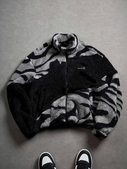 Unisex fleece jacket with stand-up collar, zipper, and animal print