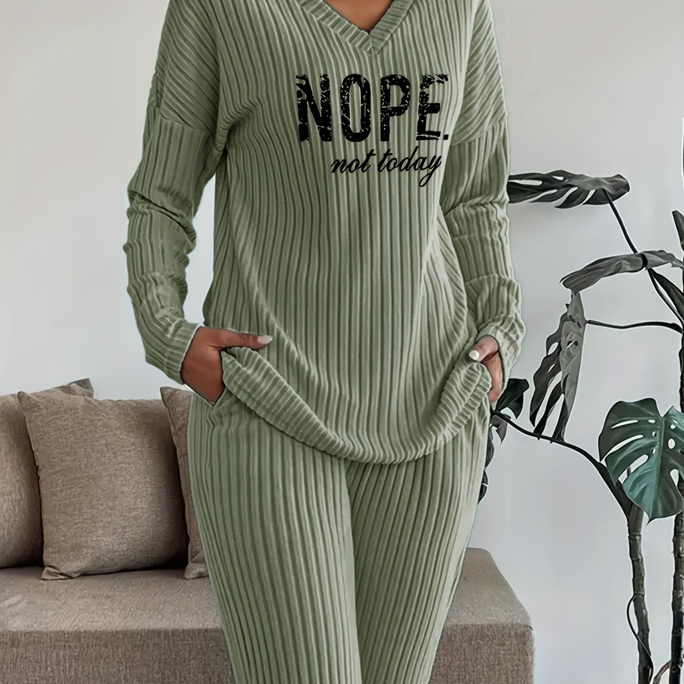 Ribbed women’s two-piece set with a V-neck top featuring lettering and wide-leg pants