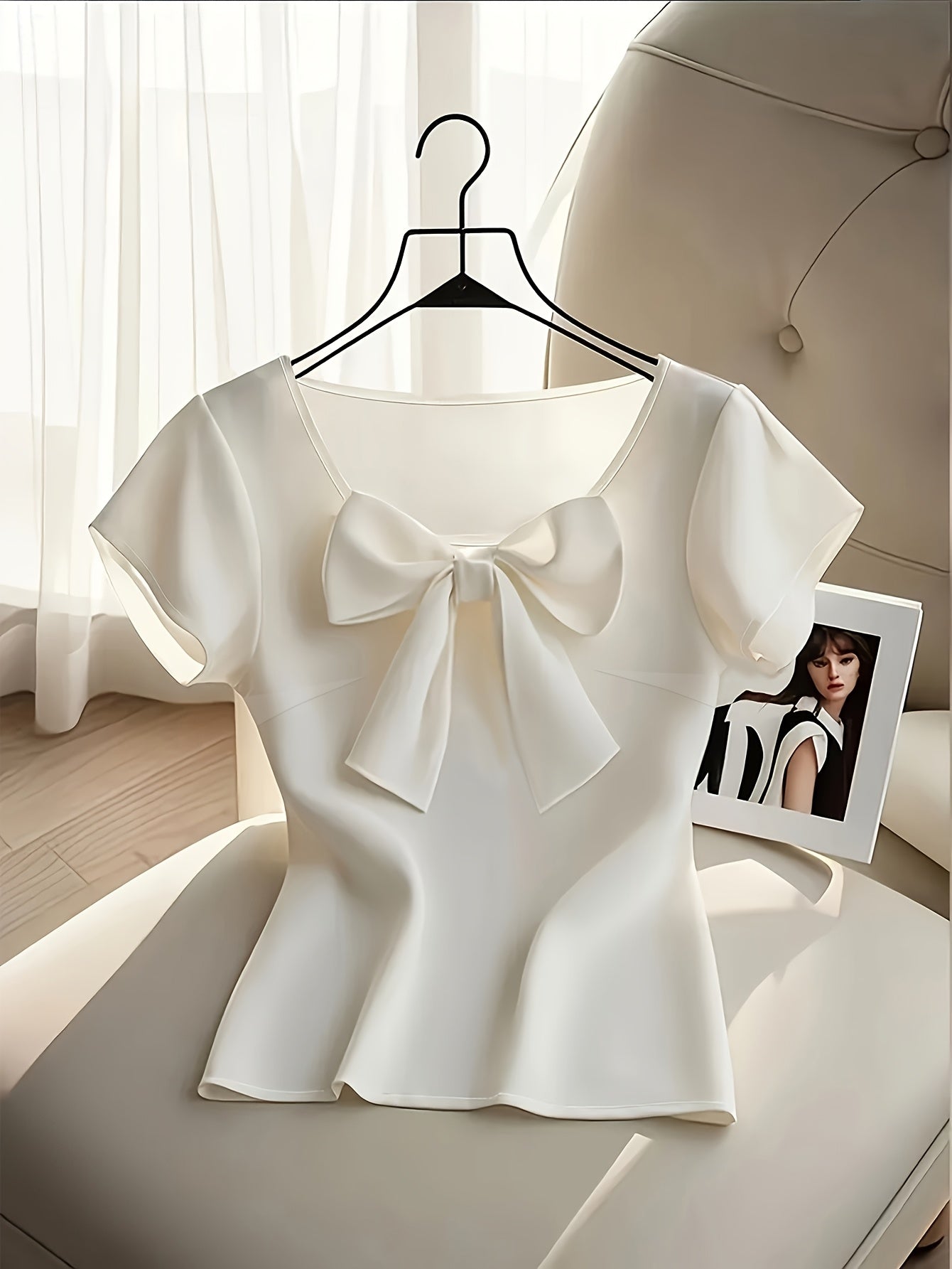 Women's blouse with bow and short sleeves – elegant style for office and special occasions