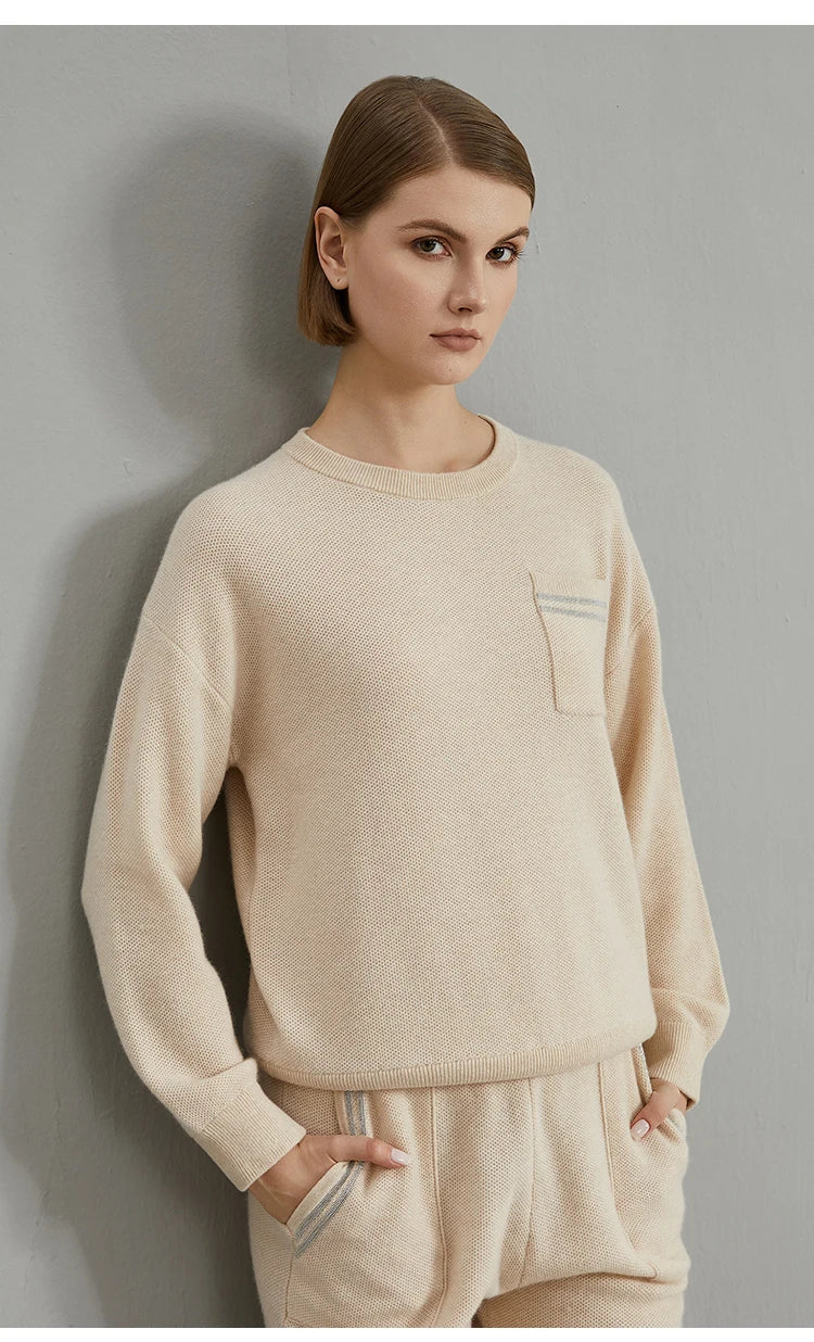 Women's crew-neck sweater with chest pocket and stripes