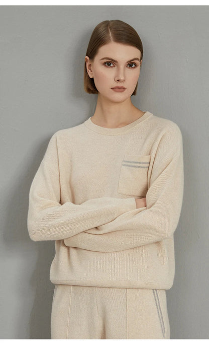 Women's crew-neck sweater with chest pocket and stripes