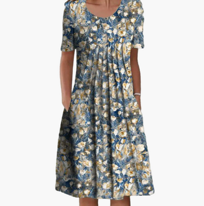 Women's summer dress with floral pattern – Loose mid-length dress with pockets, ideal for leisure and garden parties