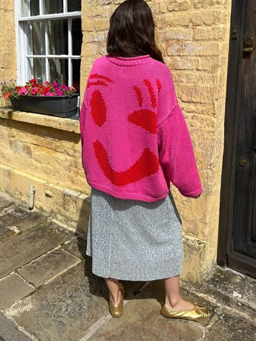 Damen Pullover mit verspieltem Gesichtsmotiv – Strickpullover im künstlerischen Stil für Freizeit & Alltag