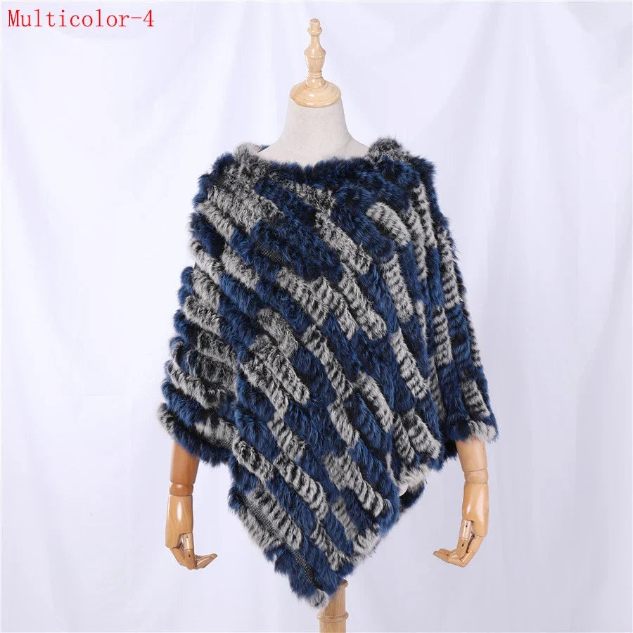 Soft faux-fur-look poncho with short sleeves, a round neckline, and an asymmetrical hem