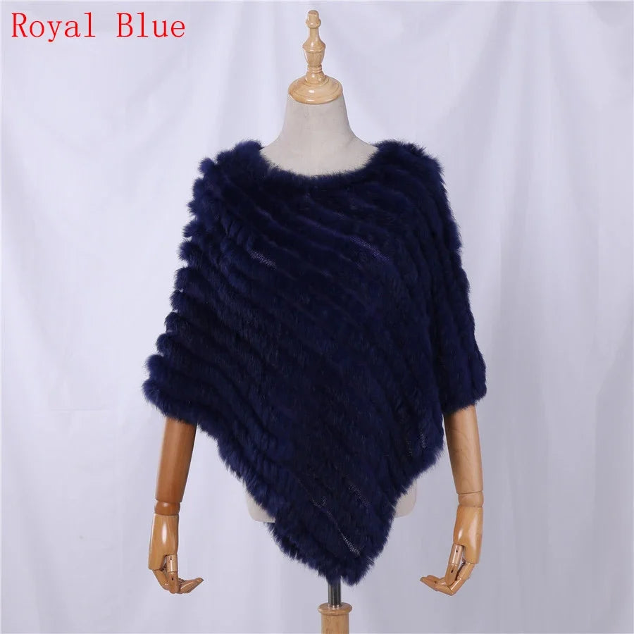Soft faux-fur-look poncho with short sleeves, a round neckline, and an asymmetrical hem
