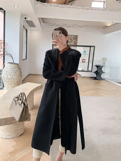 Women's winter coat with hood and fur look, long, black
