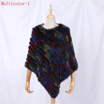 Soft faux-fur-look poncho with short sleeves, a round neckline, and an asymmetrical hem