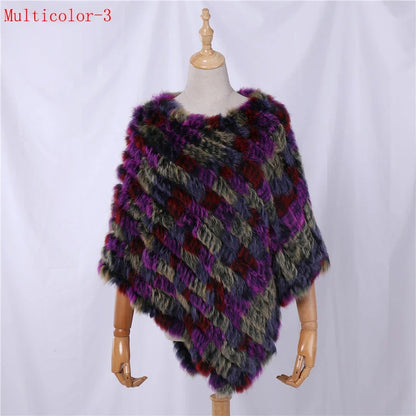 Soft faux-fur-look poncho with short sleeves, a round neckline, and an asymmetrical hem