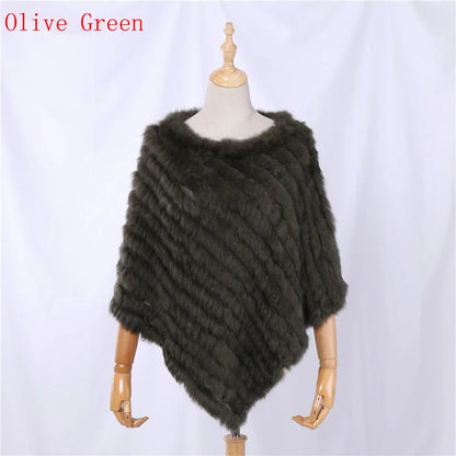 Soft faux-fur-look poncho with short sleeves, a round neckline, and an asymmetrical hem