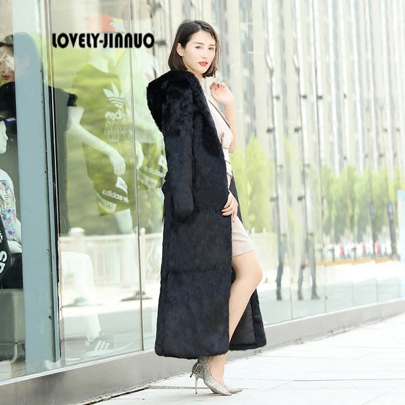 Women's long black coat with hood and belt, faux fur look