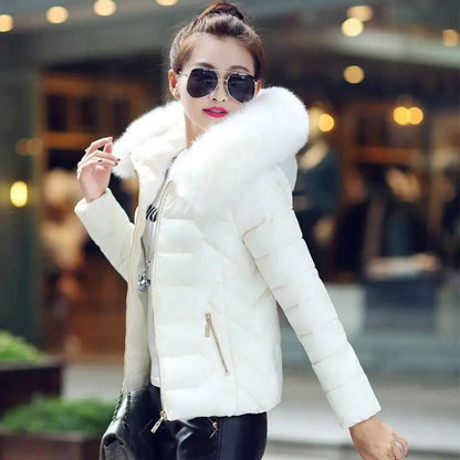 Women's quilted jacket with faux fur hood and zippers
