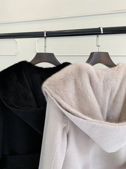 Women's winter coat with hood and fur look, long, black