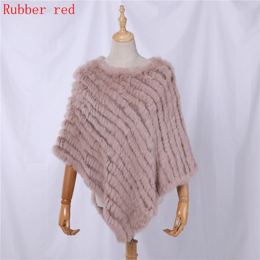Soft faux-fur-look poncho with short sleeves, a round neckline, and an asymmetrical hem