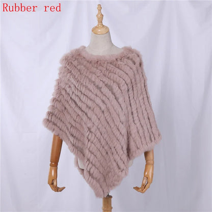 Soft faux-fur-look poncho with short sleeves, a round neckline, and an asymmetrical hem