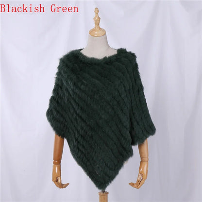 Soft faux-fur-look poncho with short sleeves, a round neckline, and an asymmetrical hem