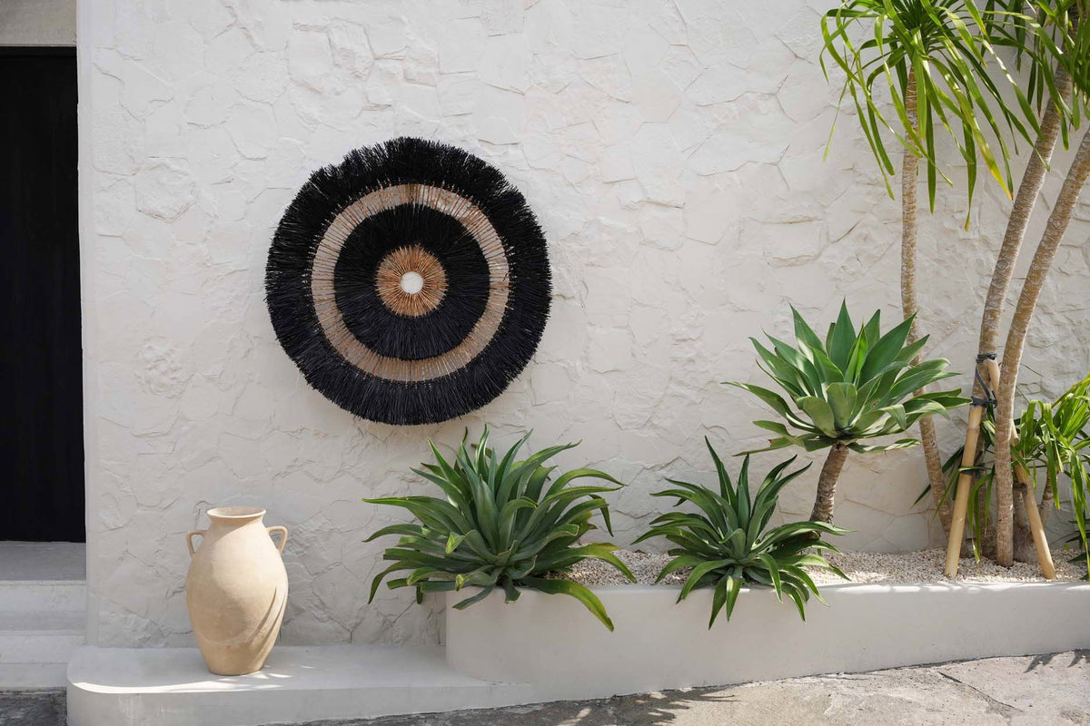 Wanddecoratie bananenblad Maurea boho zwart – Ø 110 cm, handgevlochten, rond