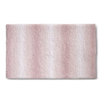 Rechthoekige hoogpolige badmat in oudroze met ombre-effect, met verticale banen die verlopen van roze naar wit