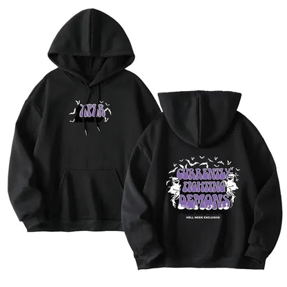 Hoodie with hood, kangaroo pocket, and back graphic, relaxed fit