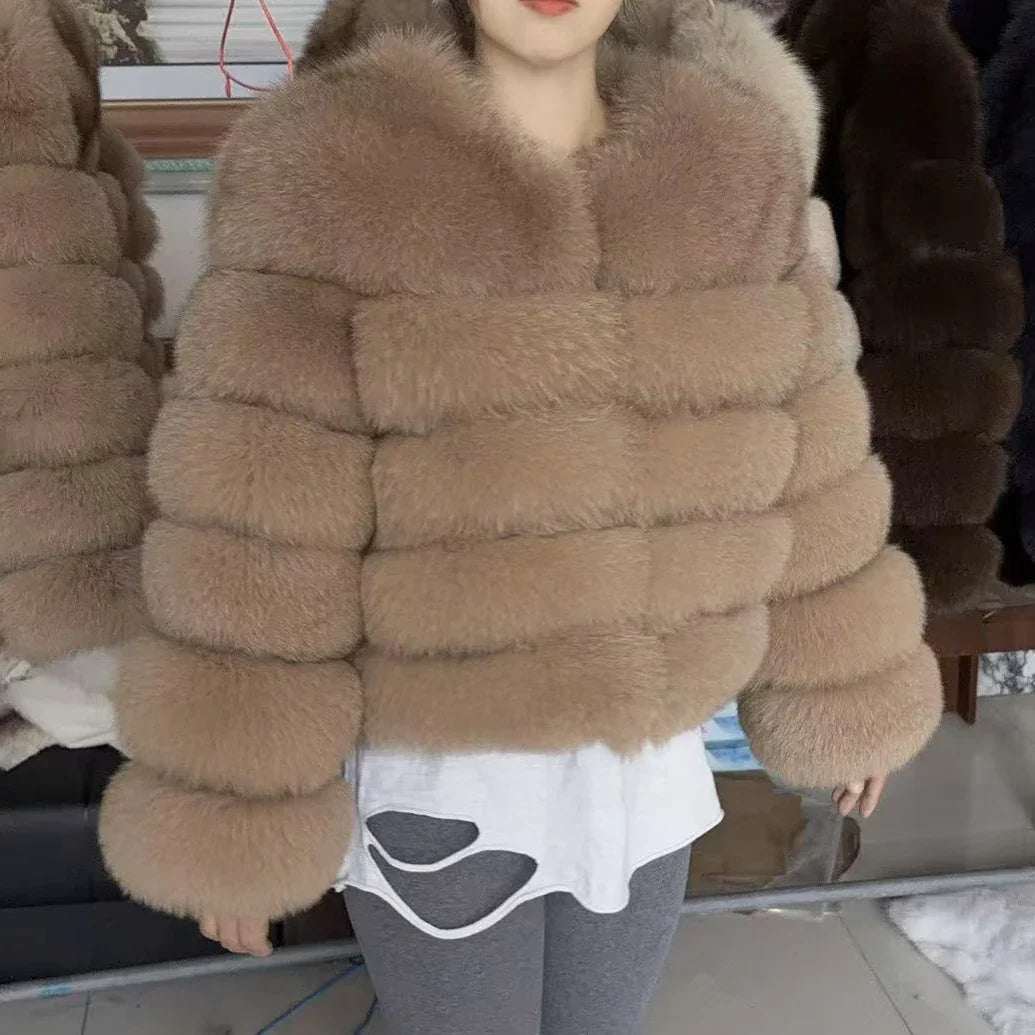 Women's faux fur jacket with voluminous sleeves and high collar