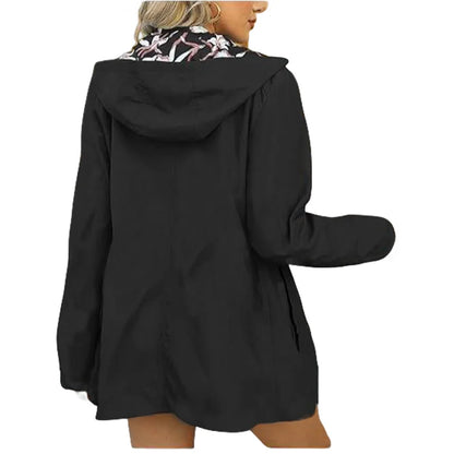 Reversible women's jacket with floral pattern, hood, and zipper, windbreaker