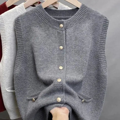 Women's knitted vest with crew neck, button placket, and pockets