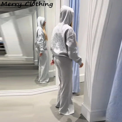 Long-sleeved hoodie with sequin wing motif on the back