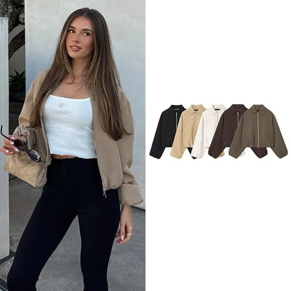 Short women's bomber jacket with collar, zipper, and long sleeves