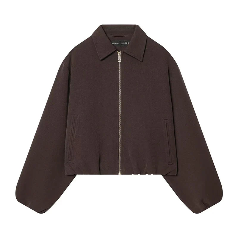 Short women's bomber jacket with collar, zipper, and long sleeves