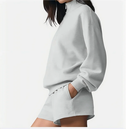 Two-piece loungewear set with stand collar and shorts, light gray