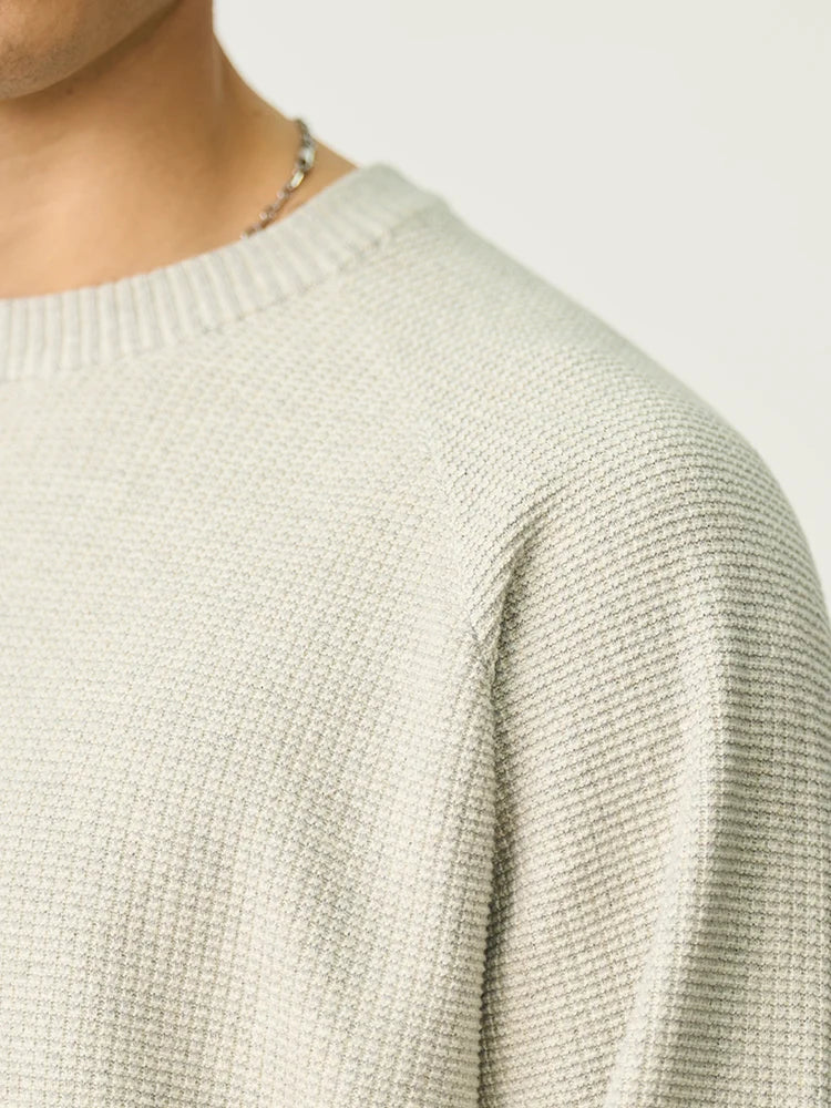 Men's blue ribbed crew-neck knit sweater, long sleeves