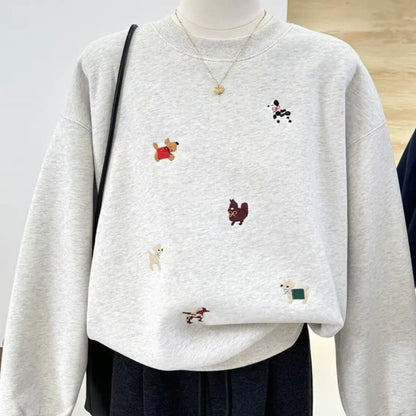 Women's crew-neck long-sleeve sweatshirt with embroidered dog motifs