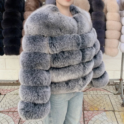 Women's faux fur jacket with voluminous sleeves and high collar