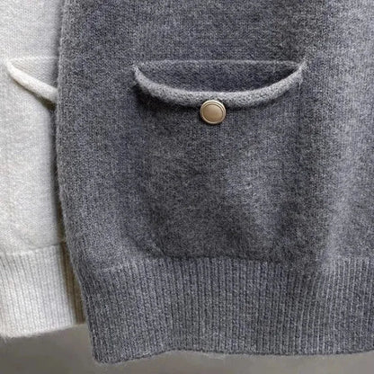 Women's knitted vest with crew neck, button placket, and pockets