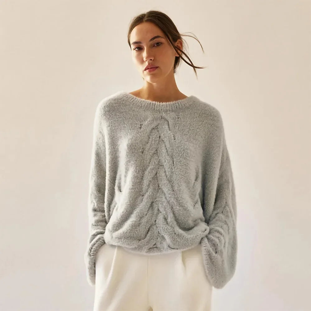 Women's oversized knit sweater with cable pattern, crew neck, long sleeves, soft