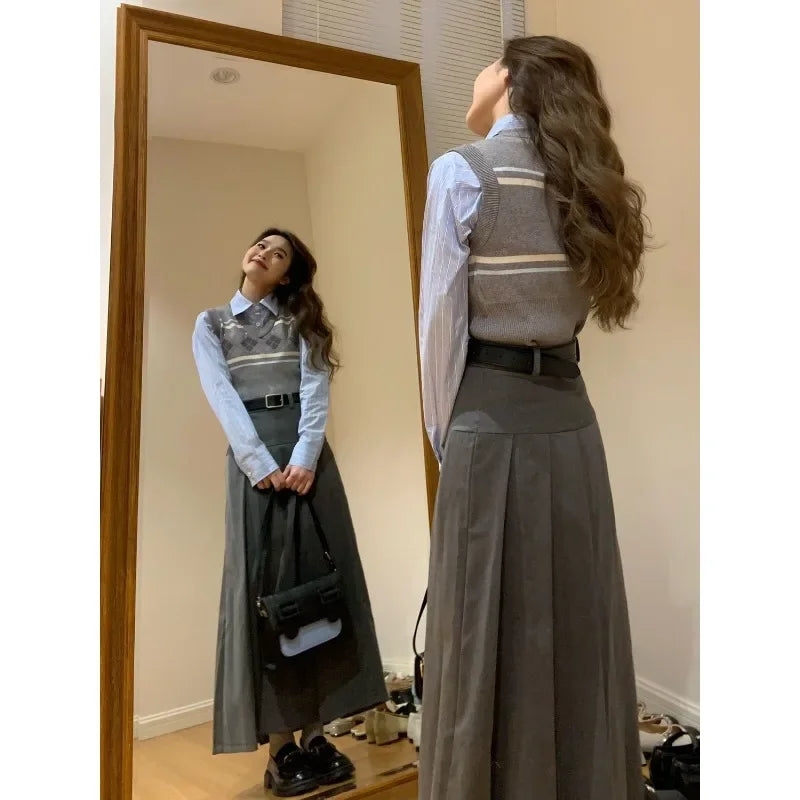 Women's gray midi pleated skirt with argyle knitted vest and shirt set