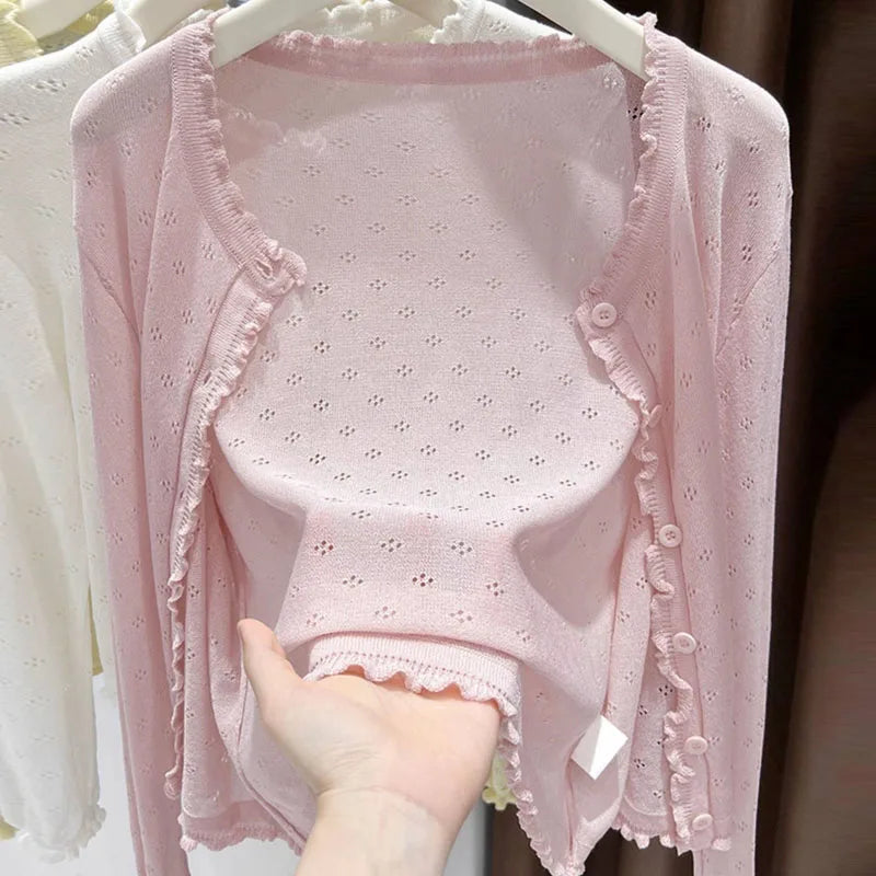 Pink women's cropped knitted cardigan with open-knit pattern, ruffled hem, summer cardigan