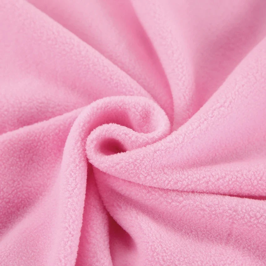 Women's pink fleece pullover with zip-up stand collar and long sleeves