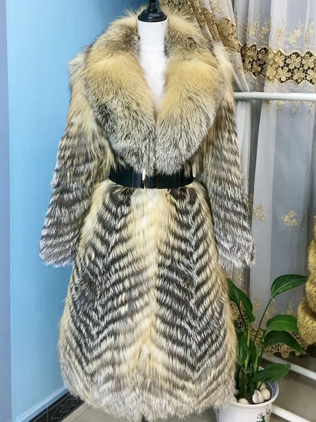 Long women's faux-fur coat with chevron pattern, warm winter coat